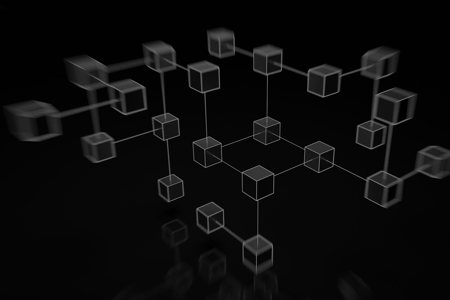 Linked cubes forming a network, in black and white